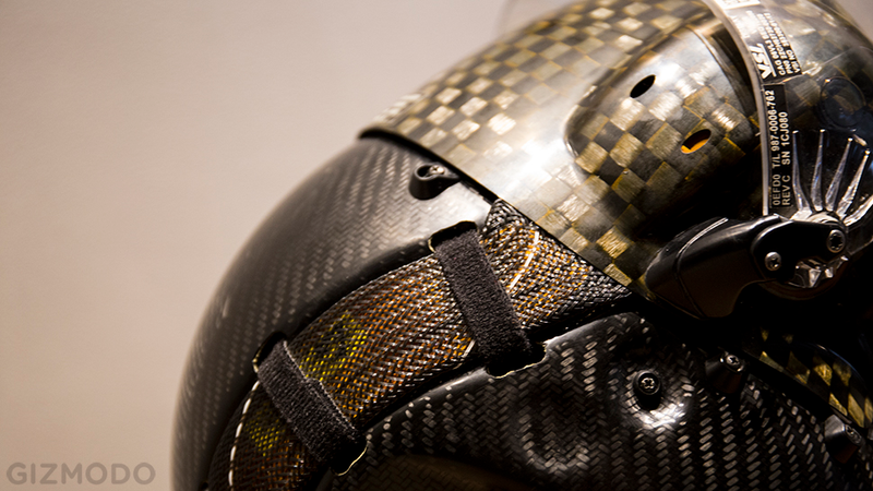 The snakeskin-looking band houses the cables that connect the helmet’s processor and sensors to the aircraft.